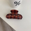 Detail of brown checkered hair claw clip with heart accents and sparkling rhinestones - Brown Heart Plaid