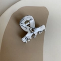 Dettaglio della molletta per capelli marmorizzata bianca e nera con strass quadrato lucido - Molla Capelli Trama Marmo (4cm x 3cm 7.2g)