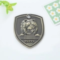 Antique bronze shield pet ID tag with 3D embossed puppy head design for dog collars - Chow Chow Style (147)