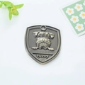 Antique bronze shield pet ID tag with 3D embossed dog portrait and Puppy engraving - Schnauzer Style (166)