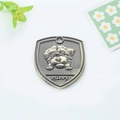 Antique bronze shield-shaped pet ID tag with puppy relief and puppy text engraving - Shih Tzu (145)