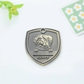 Antique bronze shield-shaped pet ID tag with puppy embossing and engraved puppy text - Briard Style (155)