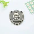 Antique bronze shield-shaped dog tag with poodle relief and Puppy engraving - Poodle Style (168)