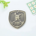 Antique bronze shield-shaped dog tag with German Shepherd relief and Puppy text - German Shepherd Style (158)