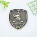 Bronze shield-shaped pet ID tag with embossed Bull Terrier and Puppy text engraving - Bolognese (154)