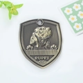 Bronze shield-shaped pet ID tag with embossed puppy design and vintage metallic finish - Dachshund Style (157)