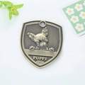 Bronze shield-shaped pet ID tag with 3D puppy relief and engraved PUPPY text - Chihuahua (171)