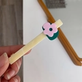 Detail einer Haarspange mit Marmortextur, rosa Blüte und grünen Blättern für Damen - Grün Blumen Haarklammer
