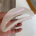 Detail of pearlescent white acetate hair claw with France Handmade gold lettering - White