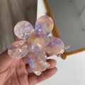 Macro detail of high-quality acetate five-petal flower hair claw clip in gradient pastel colors - Light Orange Pink Purple