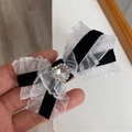 Elegant black velvet and white lace bow hair clip with a sparkling heart rhinestone center - Black Bow Hair Clip