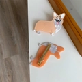 Detail view of a cute Corgi acetate hair clip with golden metal duckbill clamp - Corgi