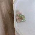 Detail showing the pink and green marbled acetate texture and France Handmade logo - Bright Green Pink