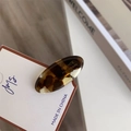 Detail of tortoise shell acetate hair clip with golden France Handmade lettering - White Brown Marble Duckbill Clip