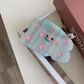 Light blue translucent shark hair clip with pink dots, smiley face and bear detail - Blue