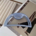 Detailed macro of dusty blue acetate hair claw clip with gold FRANCE Handmade lettering - Hollow Semi-circular Style