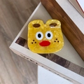 Macro detail of cute cartoon bear hair claw clip made of marbled yellow acetate - Yellow Big-eyed Monster