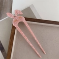 Dettaglio della forcina a U in acetato rosa marmorizzato con design a testa di coniglio - Rosa