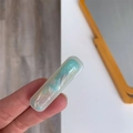 Close-up of blue marble pattern acetate hair clip featuring a rectangular minimalist design - Light Blue-Straight Duckbill Clip