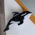 Detailed view of orca shaped hair claw clip with black and white marble texture - Black and White Orca