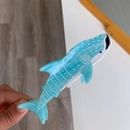 Detail view of a whale shark hair claw clip with blue acetate finish and white dot pattern - Blue Whale Shark