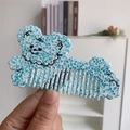 Dettaglio di un pettine a forma di cane con trama in marmo blu in acetato spesso - 12cm x 7cm / Blu