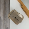 Cute toast shaped acetate hair claw in light coffee color with a happy smiley face design - Grey Smile Face Hair Claw