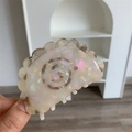Macro shot of marble textured acetate hair claw clip with rhinestone inlay and serrated edge - Gray Claw Clip