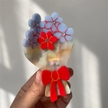 Dettaglio del fermaglio per capelli in acetato con fiori colorati e strass scintillanti - Grande / Bouquet Crema Fiore Blu