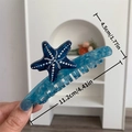 Pinza per capelli a stella marina blu in acetato con texture a conchiglia - Stile Stella Marina Blu