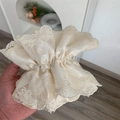 Close-up of cream white lace hair scrunchie with layered pleated texture and fabric detail - Beige Lace Scrunchie / Beige