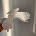 Dettaglio della molletta per capelli in acrilico floreale traslucido con glitter fini - Molla Arco Bianco