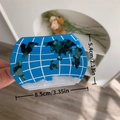 Donkerblauwe haarklem met wereldbolpatroon van acetaat en afmetingen van 8,5cm - Wereldbol Haarklem