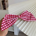 Eleganter rot-weiß karierter Haarschleifen-Clip aus Stoff, Vintage-Stil handgehalten - Rot