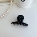 Dettaglio del fermaglio per capelli in acetato nero con strass colorati e vivaci - Nero