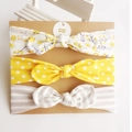 Set of 3 baby cotton bow headbands with floral, polka dot, and striped patterns on card - Yellow Floral Yellow Polka Dot And Grey Stripes Style