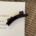 Detailed close-up of dark brown cat-shaped acetate hair clip with gold details and rhinestones - Brown Cat Banana Clip
