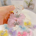 Detailed macro view of pink mesh bow hair clips with sparkling silver crown rhinestones - Hair Tie / Pink