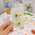 Close-up of cute avocado embroidered hair clips with green mesh and safe fabric lining - Avocado (Duckbill Clip)