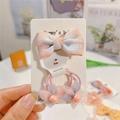 Détail de la pince à cheveux à nœud rose et de l'ensemble de chouchous pour filles - Style 4 Pince à Nœud et Liens Fleurs (3119)