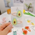 Close-up of cute embroidered avocado hair clips with pink fabric for little girls - Avocado (Snap Clip)