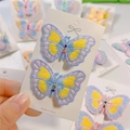 Close-up of embroidered butterfly hair clips with colorful rhinestones on a card - Style 3(3#)