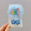 Détail d'une pince à cheveux fleur en résille bleue et de deux barrettes étoiles brillantes - Design de Météore Bleu (5398882694728)