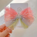Detail showing gradient mesh bow hairclip with glitter powder and rhinestone crown decoration - Hair Clip / Gradient Rose Red Olive Yellow