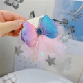 Macro detail of gradient glitter bow hairpin with blue gem and silver star tulle - Gradient Hair Clip 4
