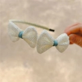 Kids headband with three white glitter bows and light blue ribbon detail for girls - Cream And Cream Hairband