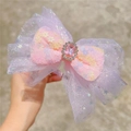 Detail of pink and purple sequin bow hair clip with faux gemstone and rhinestones - Headband / Pink