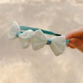 Kids hair hoop with three white glittery bows on a teal fabric wrapped headband - Cream And Green Hairband