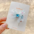 Barrette nœud en tulle bleu clair avec gemme cœur bleue et étoiles dorées pour fille - Pince Bec de Canard Bleue