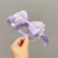 Detalle de diadema morada con lazo, encaje y detalles de perlas para niñas - Morado
